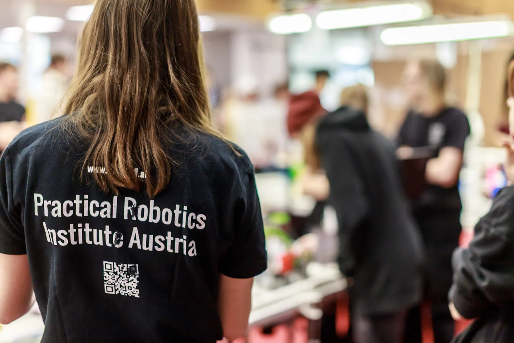 A PRIA shirt at ECER, the institute ERAA succeeds